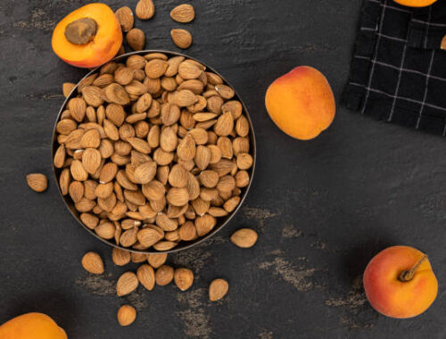 Some shelled Apricot Kernels as detailed close up shot (selective focus)